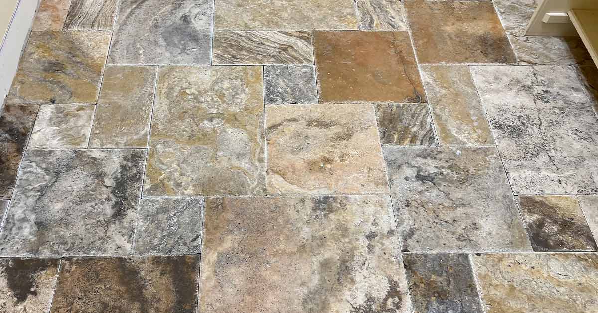 There are a variety of colors in this travertine Versailles pattern.