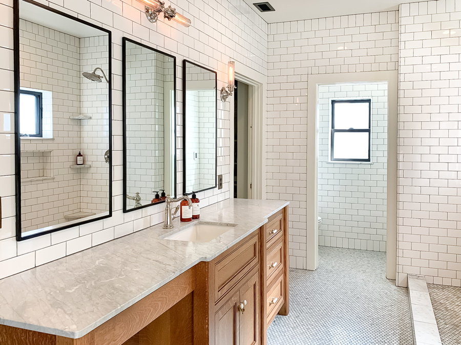 Large bathroom with subway tile walls and small hexagon tile floors
