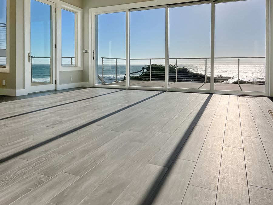 Large tile floor in living room overlooking the ocean