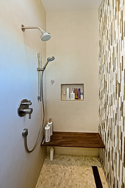 Walk in shower with custom wall tile