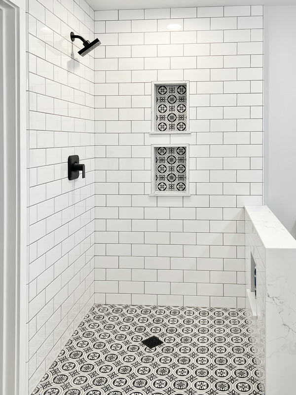 Subway Tile Shower with Mosaic Niche